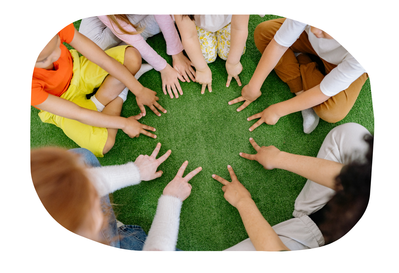 a set of hands in circle with fingers pointing